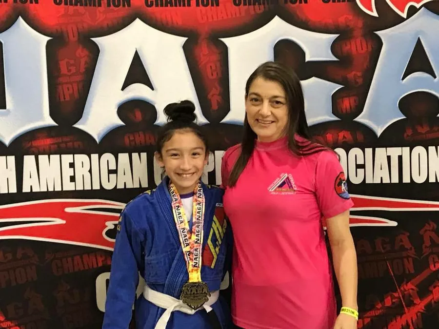 GMA Jiu Jitsu competitor with NAGA medals